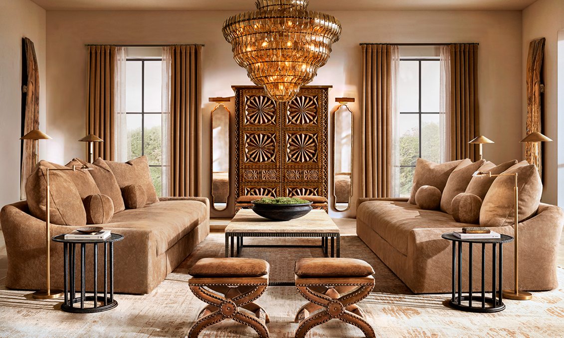 Valencia Bar Cabinet – in a living room setting with sofas and a chandelier