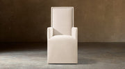 Alexandria Fabric Dining Armchair With Nailheads – front view in natural-toned upholstery