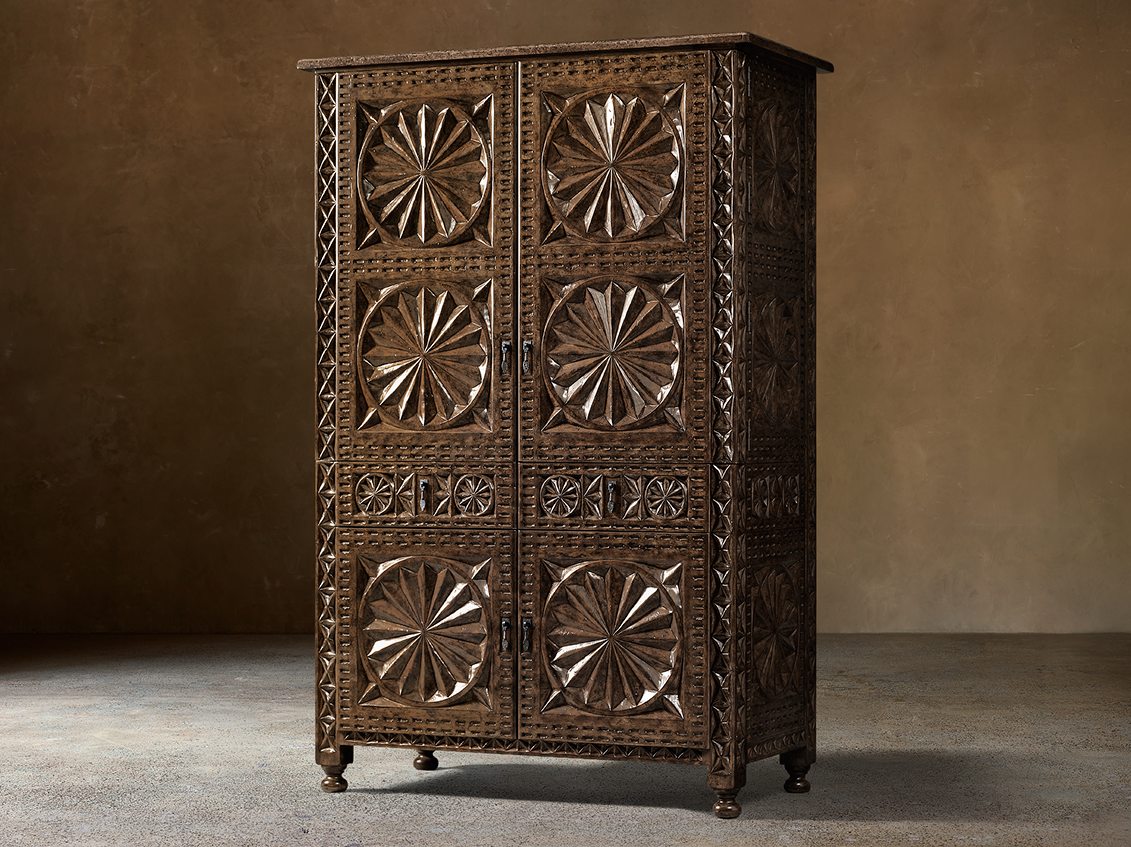 Valencia Bar Cabinet – front view of the carved doors in a lighter brown finish