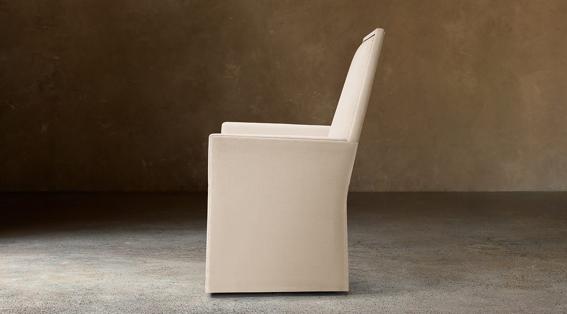 Alexandria Fabric Dining Armchair With Nailheads – side view in natural-toned upholstery