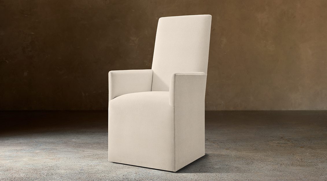 Alexandria Fabric Dining Armchair – three-quarter view in natural-toned upholstery
