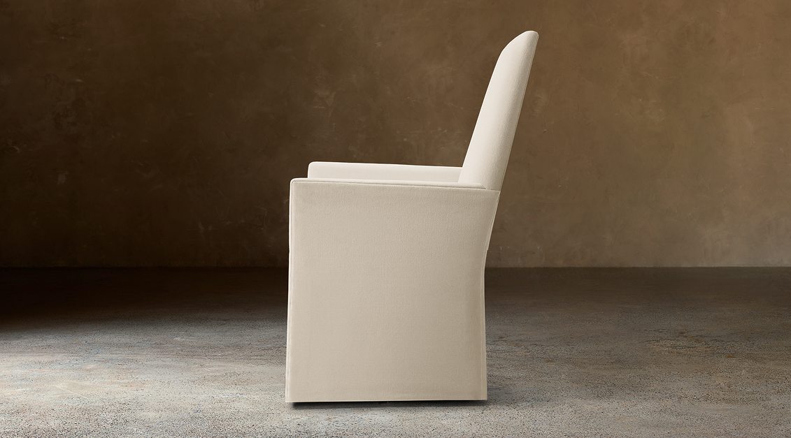 Alexandria Fabric Dining Armchair – side view in natural-toned upholstery