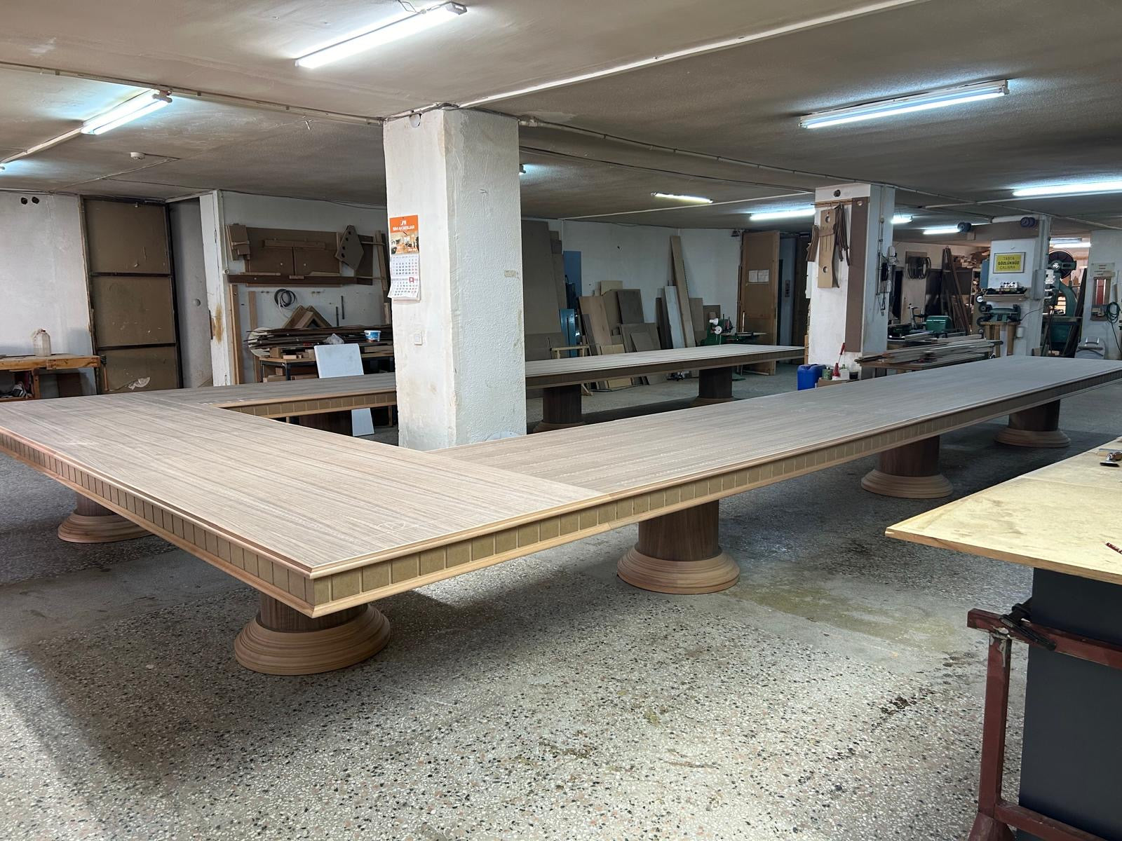 Long wood tables being made in the workshop